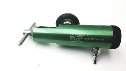 Green cylindrical roscoe medical mini oxygen regulator with black end caps and metallic fittings for medical use