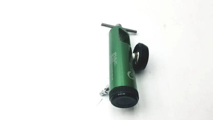 Green cylindrical roscoe medical mini oxygen regulator with black accents and t-shaped handle for medical use