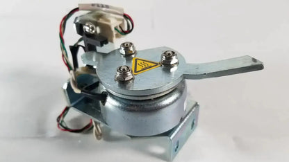 Silver metallic electric motor with warning label and wiring for Saia Burgess ledex products hospital surplus use