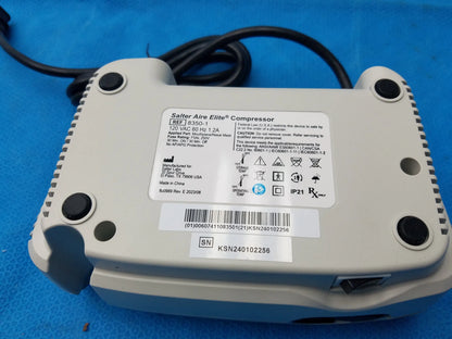Gray plastic salter labs aire elite compressor nebulizer with black feet and label showing model number and certifications