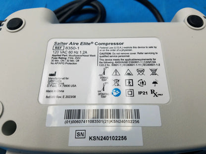 White plastic salter labs aire elite compressor nebulizer with black ports and label showing specs and compliance markings