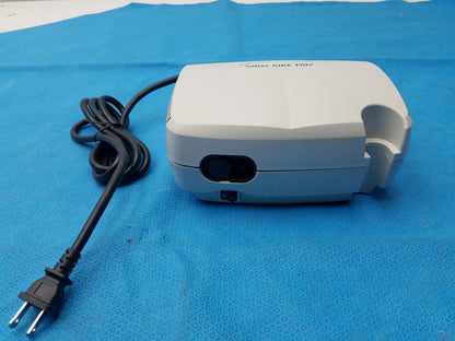 White salter labs aire elite compressor nebulizer with black power cord and plug for respiratory therapy use