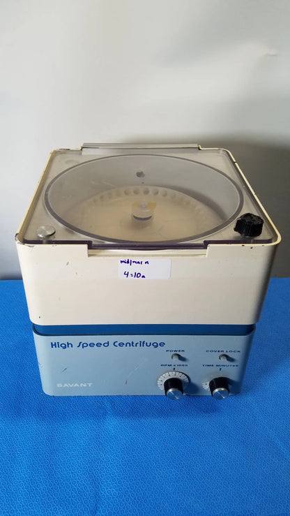 Beige and blue savant hsc 10k-115 high speed centrifuge with clear lid and control knobs for medical equipment use