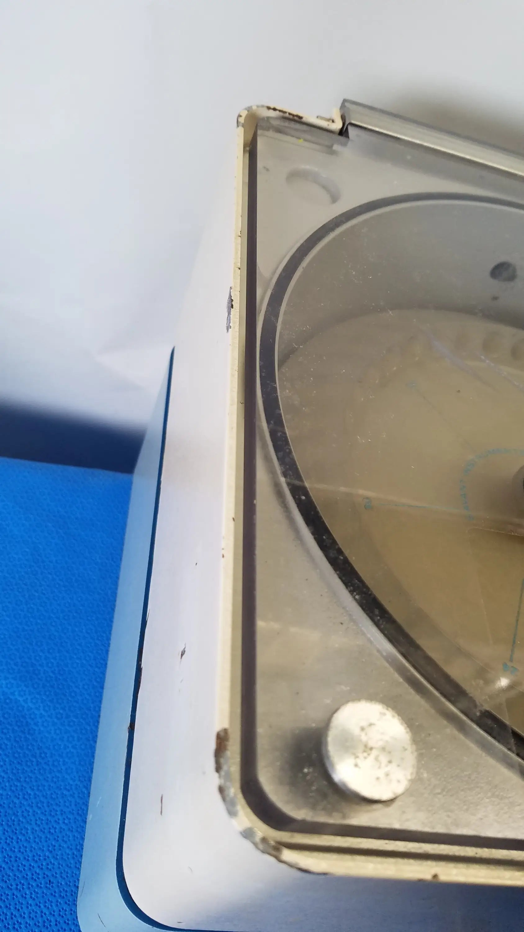 Savant HSC 10K-115 high speed centrifuge medical equipment with worn metallic body and transparent window showing reuse components