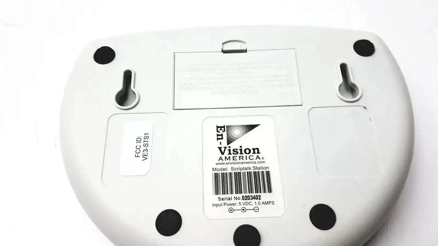 White plastic Script Talk Station audible prescription reading device with black feet and central model label visible