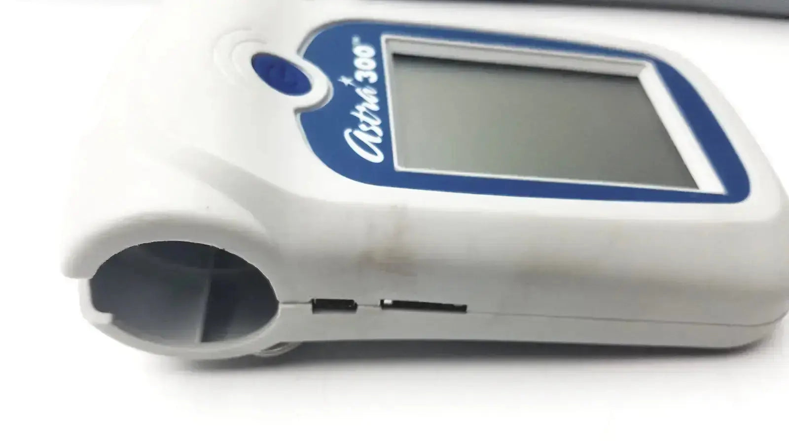 White plastic astru 300 glucose meter with blue-accented display and curved handle for buy used medical equipment
