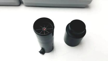 Black cylindrical ink cartridge with red dot and radial slots on top next to cap for sdi-astra 300 spirometer buy used medical equipment