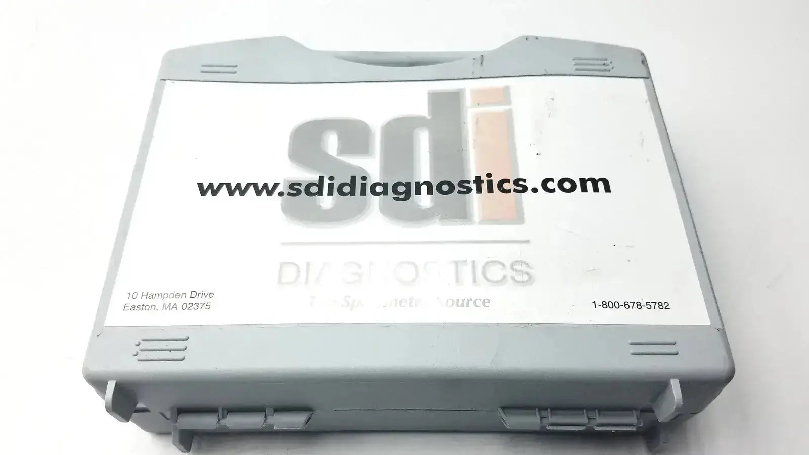 Gray plastic case with white label showing sdi diagnostics logo and contact info for sdi-astra 300 spirometer used medical equipment for sale