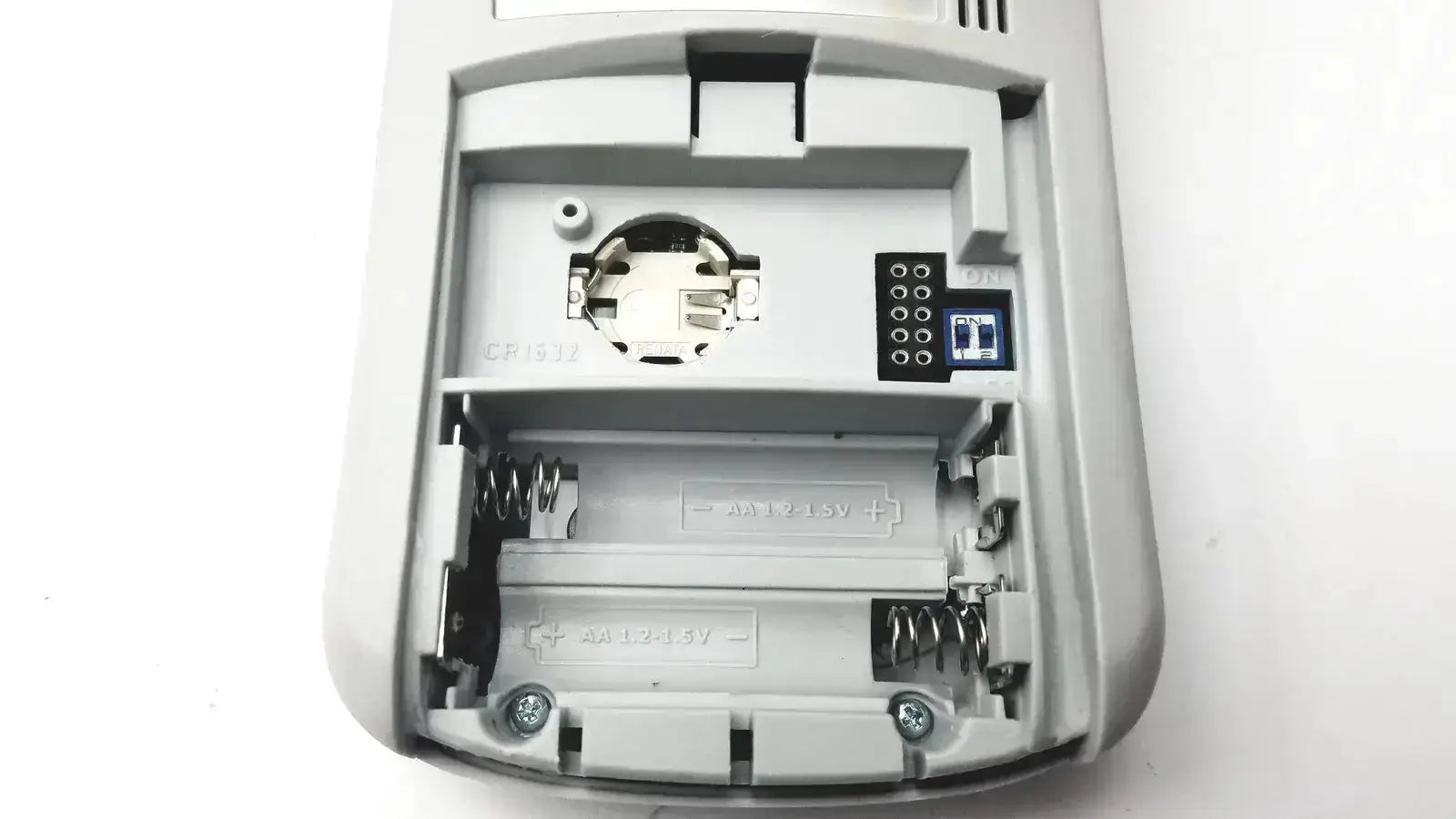 Gray plastic battery compartment with two aa batteries and digital display on back of sdi-astra 300 spirometer pre owned medical equipment for sale