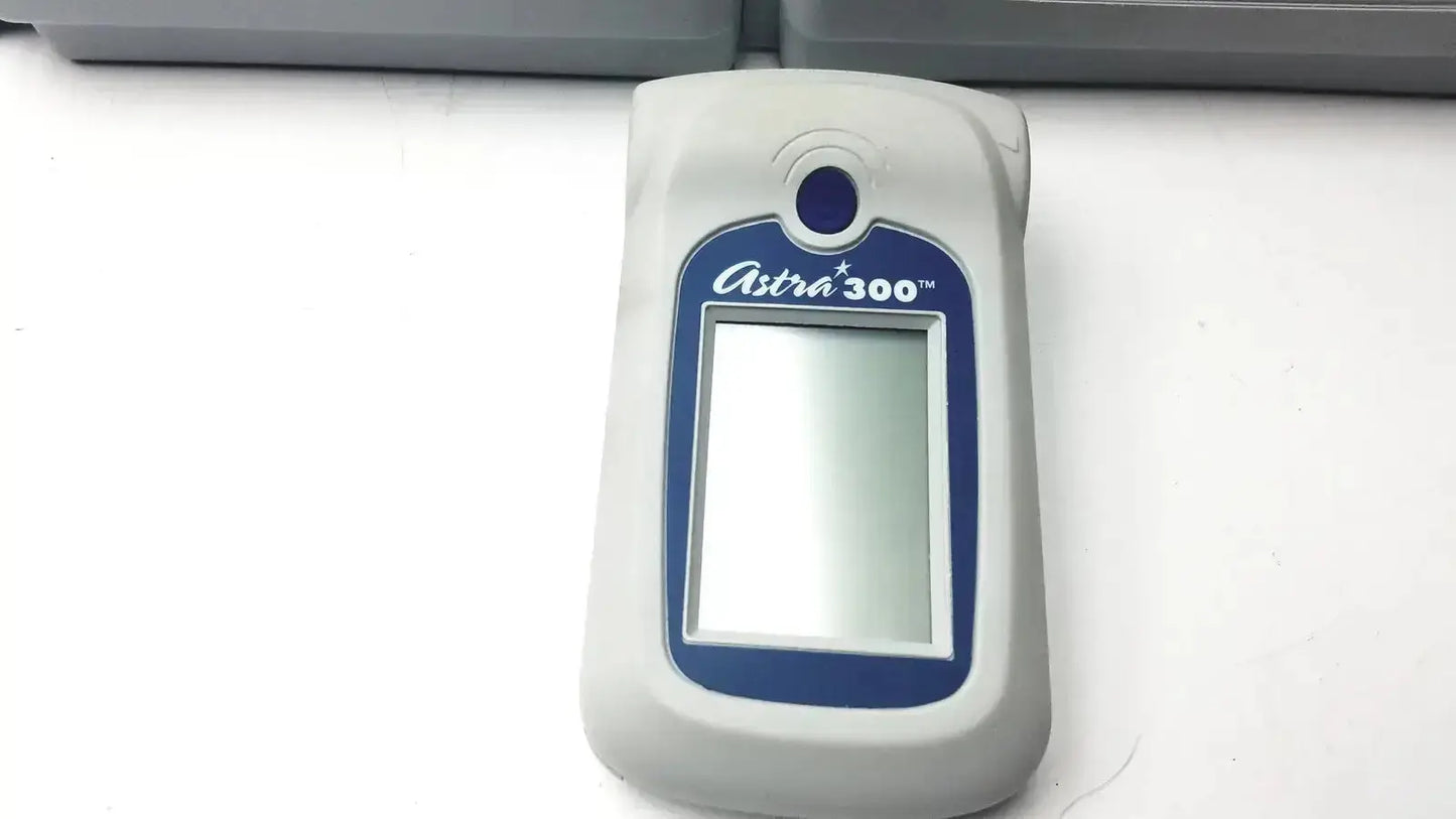Gray and blue astra 300 handheld spirometer with rectangular screen available as pre owned medical equipment for sale