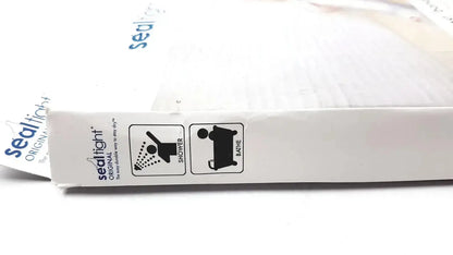 White rectangular box for seal tight original cast bandage protector with black shower and bath safety icons