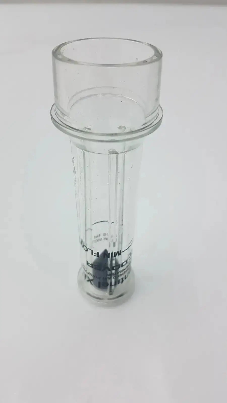Clear plastic cylindrical flow meter with wider top and printed text for sentinel xl ilc dover min usage
