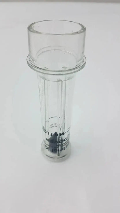 Clear plastic cylindrical flow meter with wider top and printed text for sentinel xl ilc dover min usage