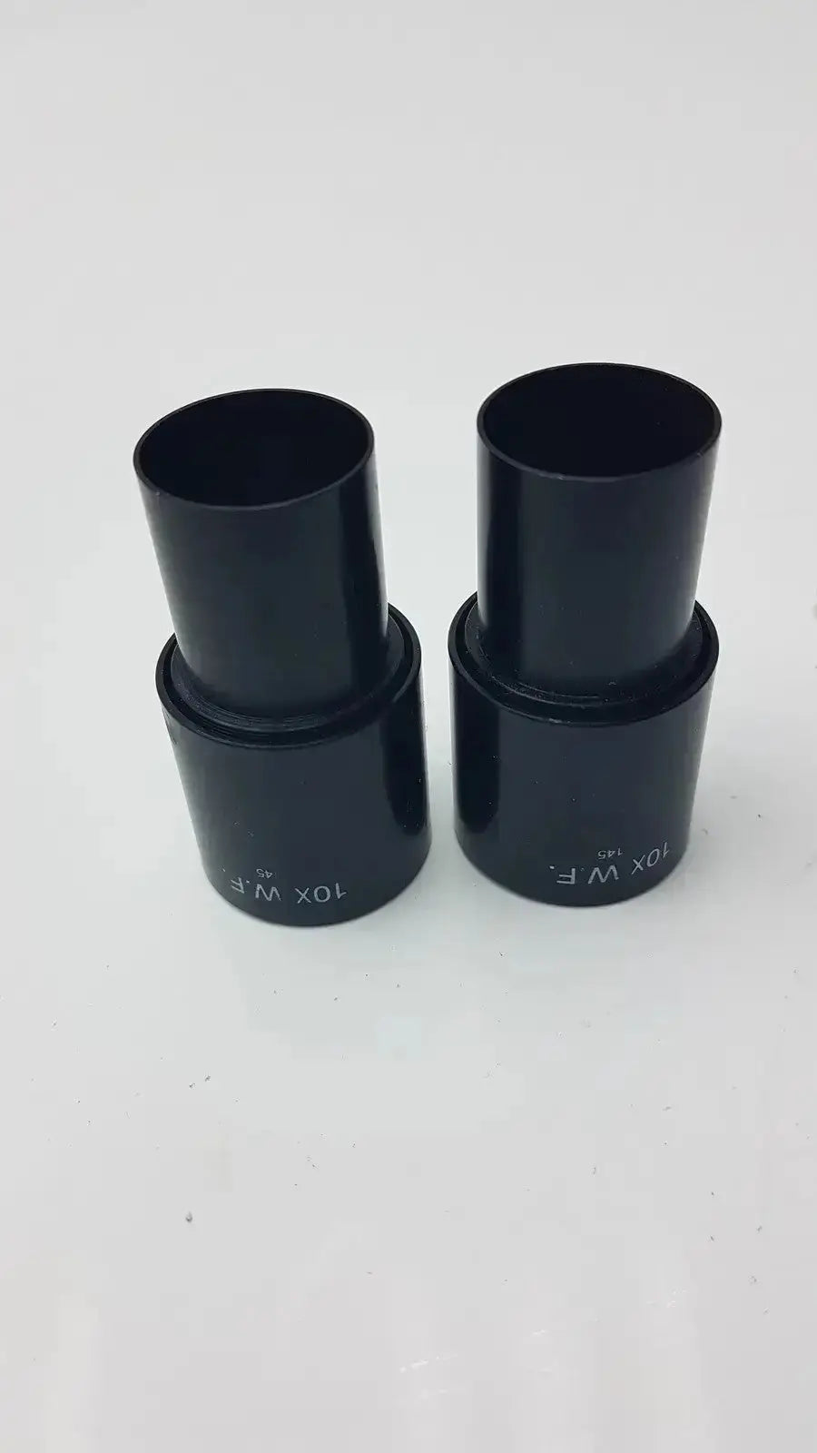 Black cylindrical 10x wide field optical lenses from american optical set of 2 cat 145 for precise magnification