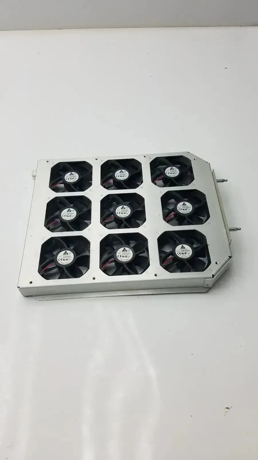 Silver metal brushless fan tray with nine black fans in a 3x3 grid model afb0924vh cooling array