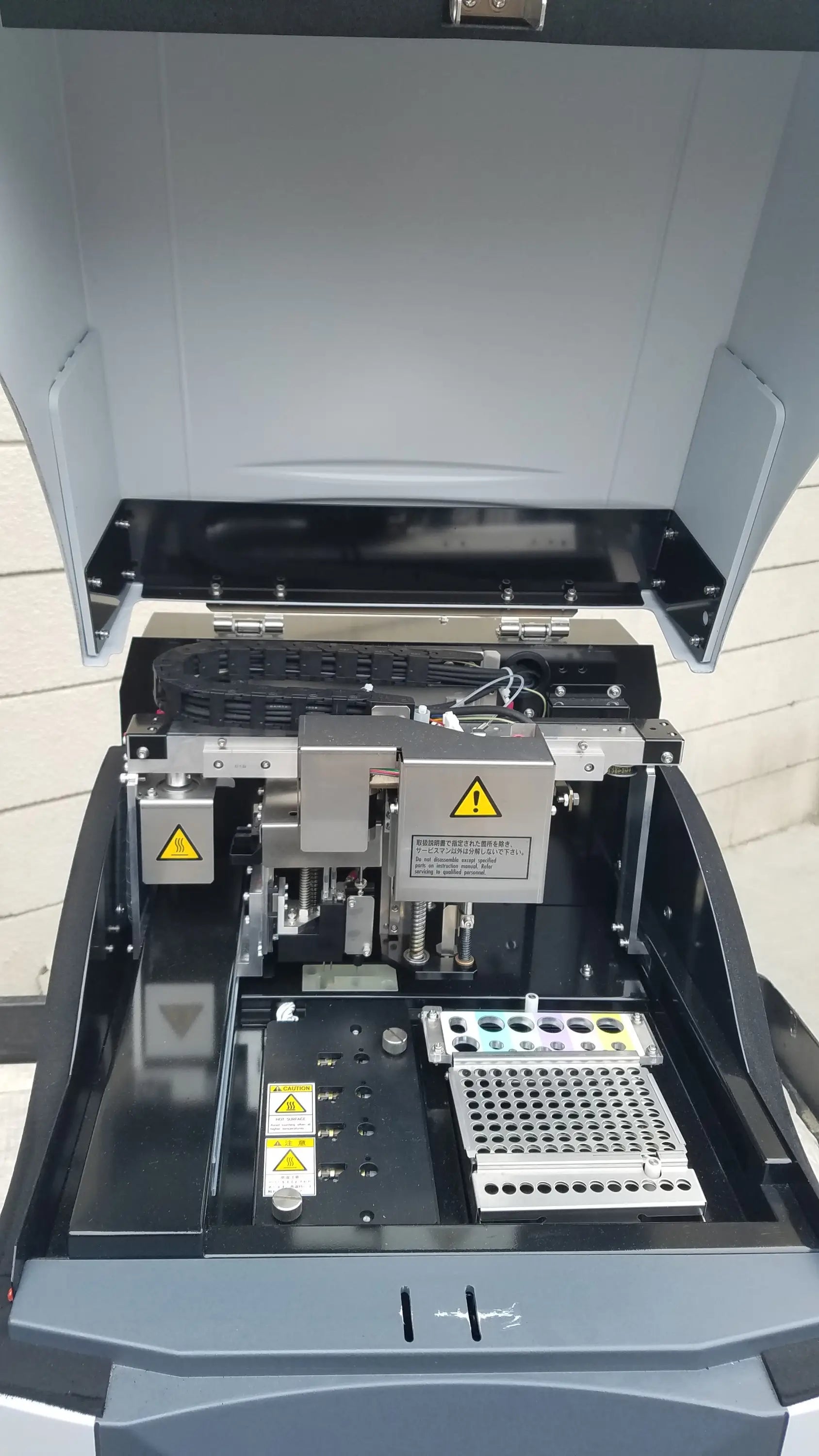 Black and gray Shimadzu MCE-202 multina microchip electrophoresis medical equipment with hinged lid and sample trays
