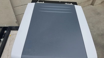 Gray and white treadmill with sleek modern design shown with Shimadzu mce-202 multina microchip electrophoresis system medical equipment