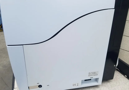 White shimadzu mce-202 multina microchip electrophoresis system with sleek black curved design and rectangular power button for medical equipment use