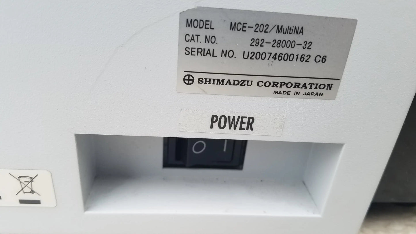 White Shimadzu MCE-202 MultiNA microchip electrophoresis system with black power switch made in Japan for medical equipment use