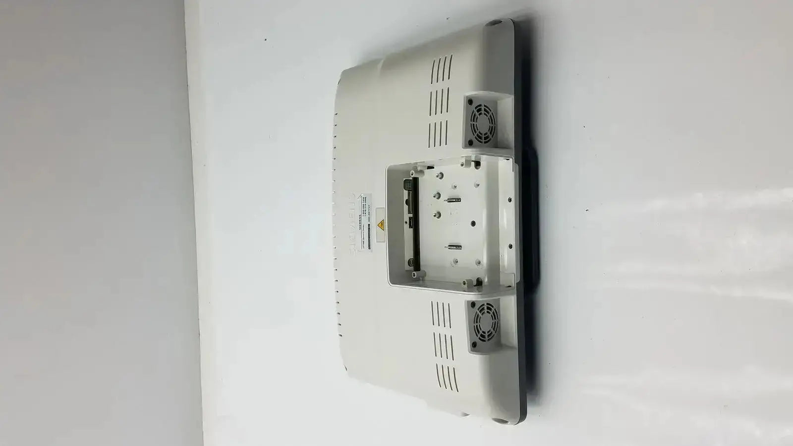White plastic back side of siemens kt-lm215fds fhd flat panel panel display monitor with ventilation grilles and fans