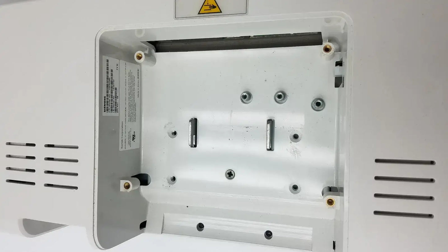 Interior view of white plastic kt-lm215fds fhd flat panel display monitor with metallic screws and mounting slots