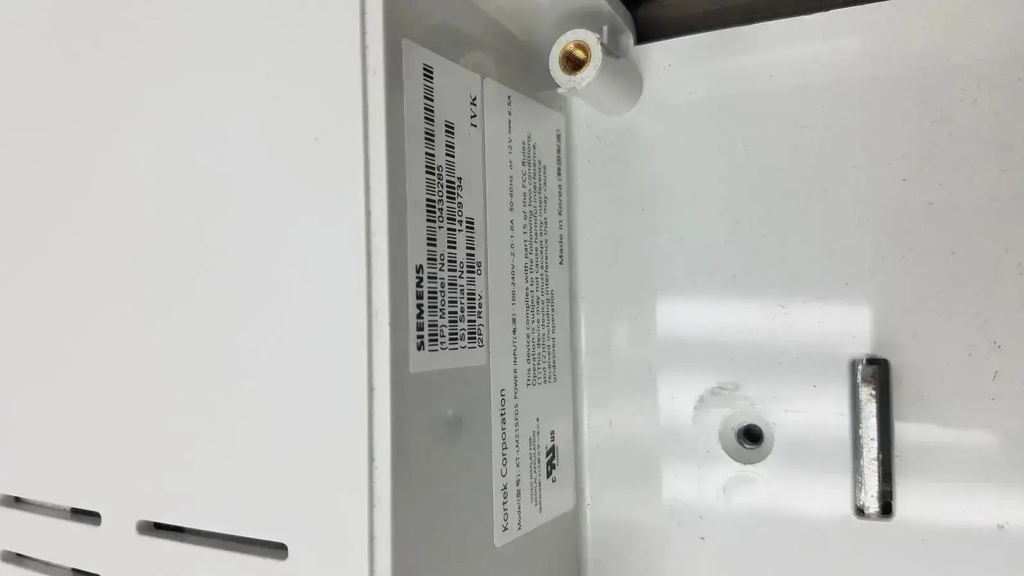 White siemens label with black text and barcode on the back of a siemens kt-lm215fds fhd flat panel display monitor