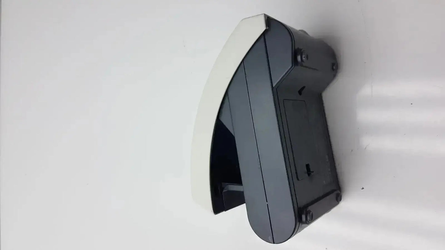 Black and white plastic wall-mounted siemens clinitek status analyzer with curved top edge for clinical testing use