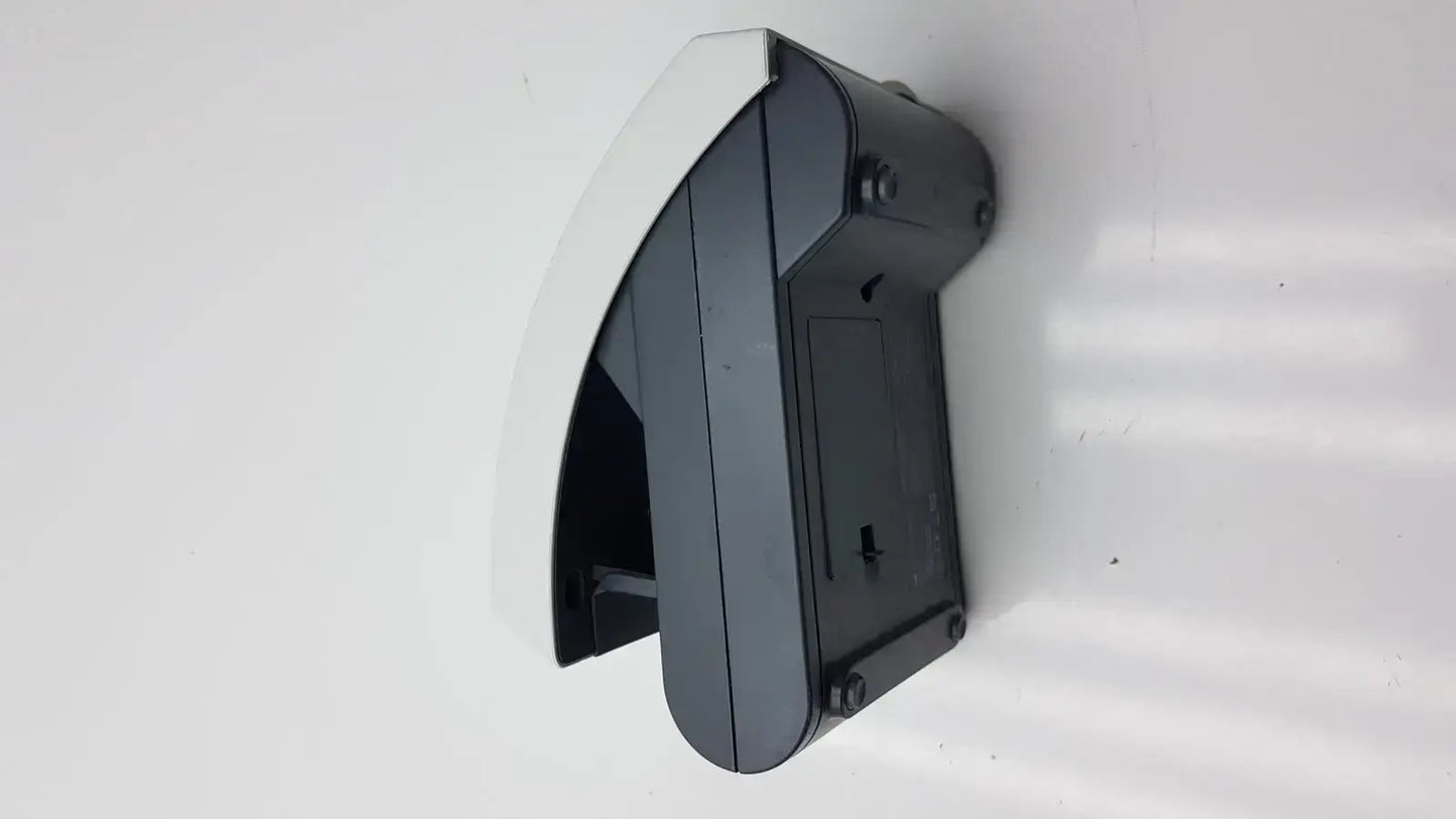 Siemens clinitek status analyzer with curved angular black and white plastic wall-mounted design for medical use