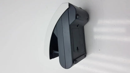 Siemens clinitek status analyzer with curved angular black and white plastic wall-mounted design for medical use