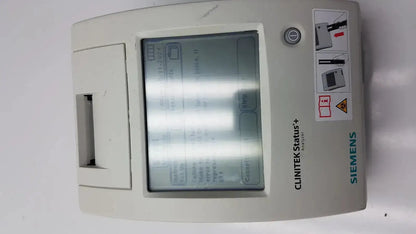 Siemens clinitek status analyzer 004979 medical device with gray plastic casing and digital display screen