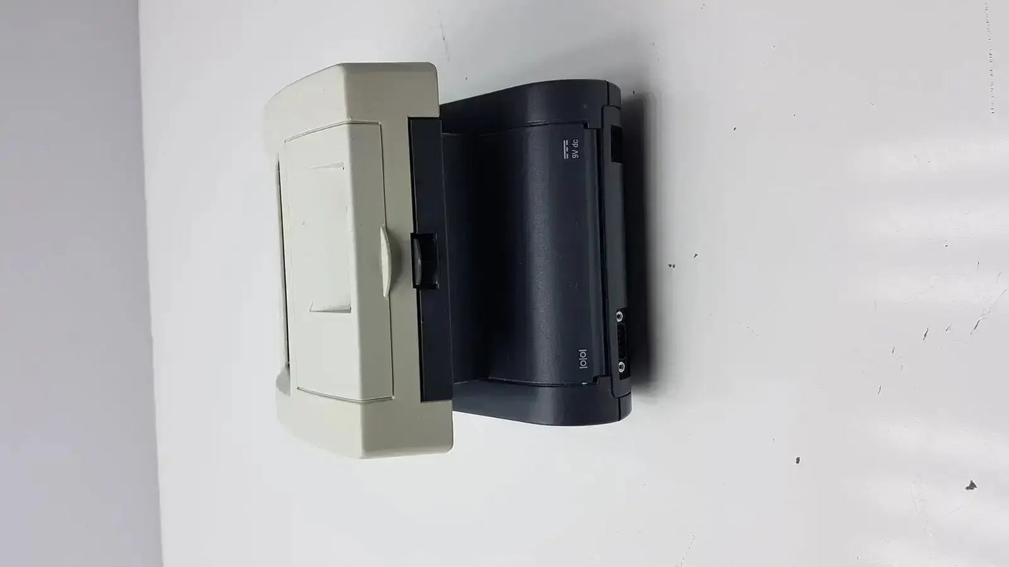 Beige and black desktop scanner with sleek modern design for siemens clinitek status analyzer model 004979
