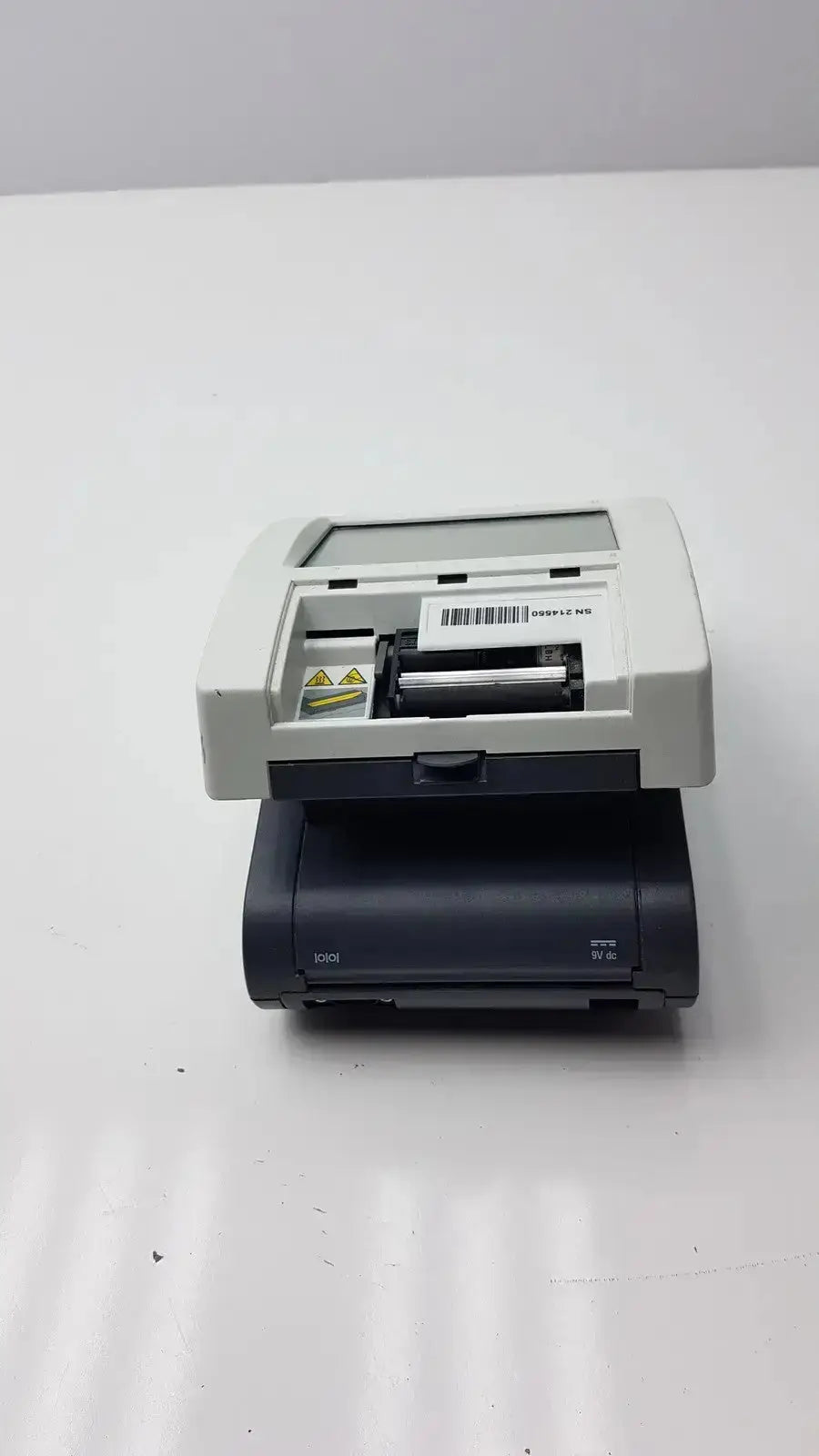 Gray and black desktop scanner with sleek modern design siemens clinitek status analyzer model 004979