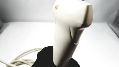 Cream-colored plastic game controller with matte finish and ergonomic grip design for siemens la435 transducer probe use
