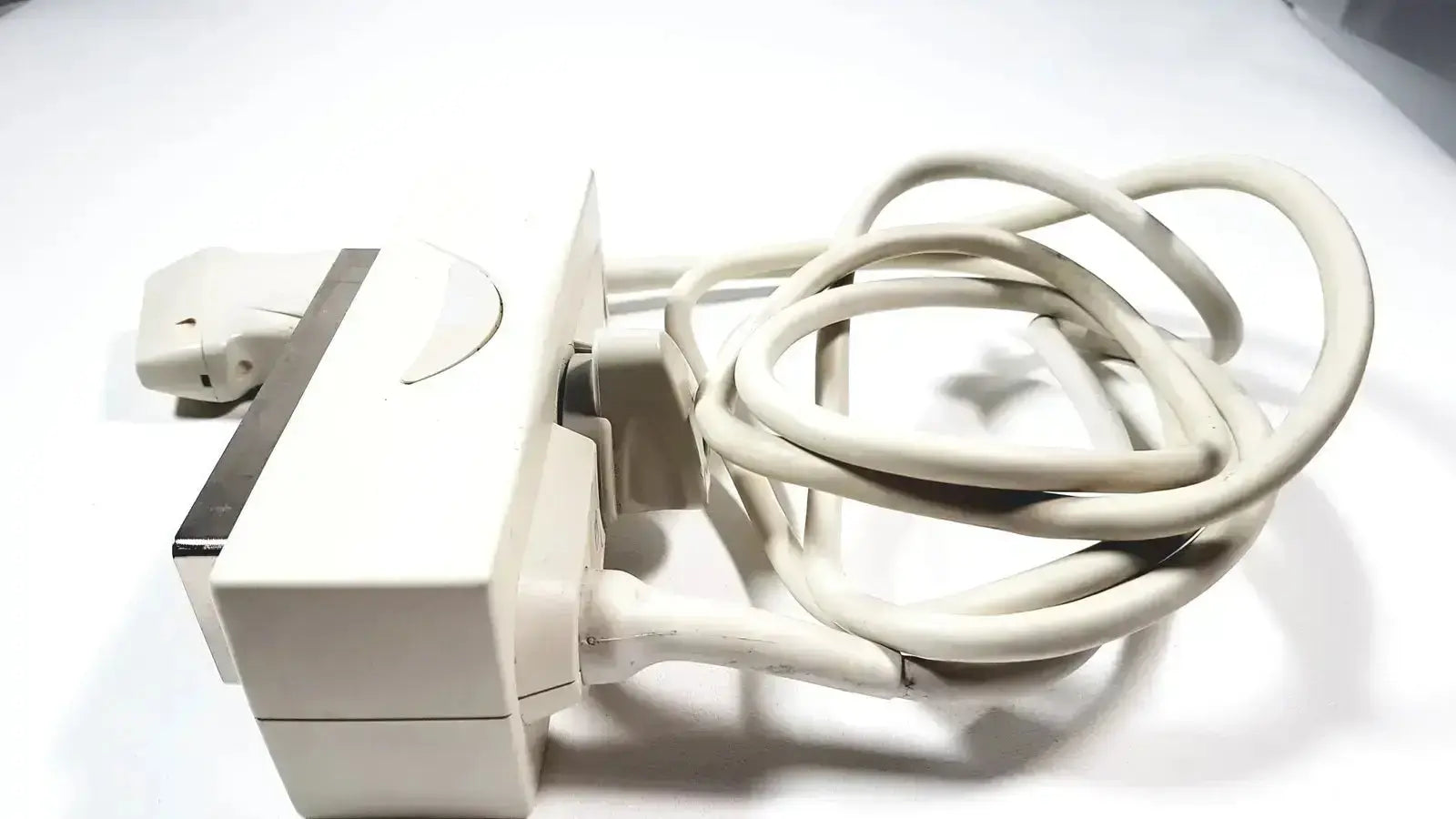 Off-white plastic power strip with coiled beige cable and metallic accent for siemens la435 transducer probe acuson p300
