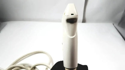 White plastic hair straightener with black grip and coiled power cord compatible with siemens la435 transducer for acuson p300