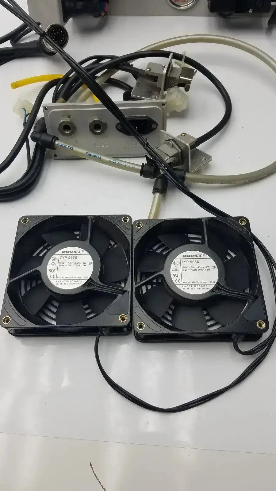Two black square cooling fans with white labels and metallic screws for siemens logo 230rc 6ed1 052-1fb00-0ba4 product