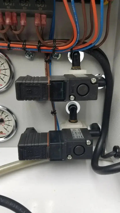 Black industrial electrical relays with silver screws on control panel in siemens logo 230rc 6ed1 052-1fb00-0ba4 product