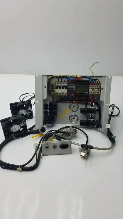 Gray metal siemens logo 230rc 6ed1 052-1fb00-0ba4 industrial control panel with black fans and pressure gauges