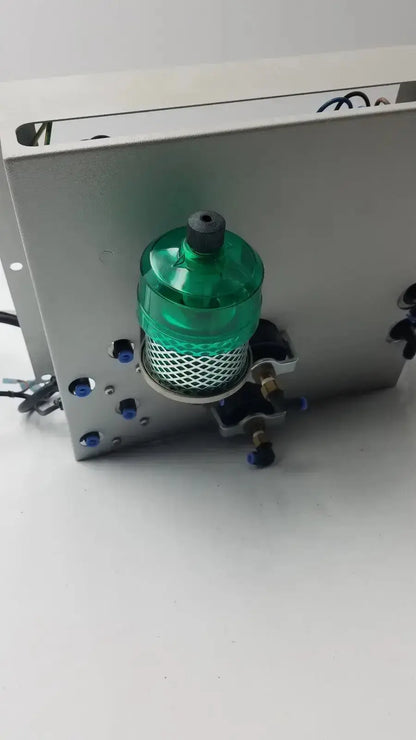 Green translucent cylindrical filter with mesh interior mounted on metallic plate for Siemens 230rc 6ed1 052-1fb00-0ba4