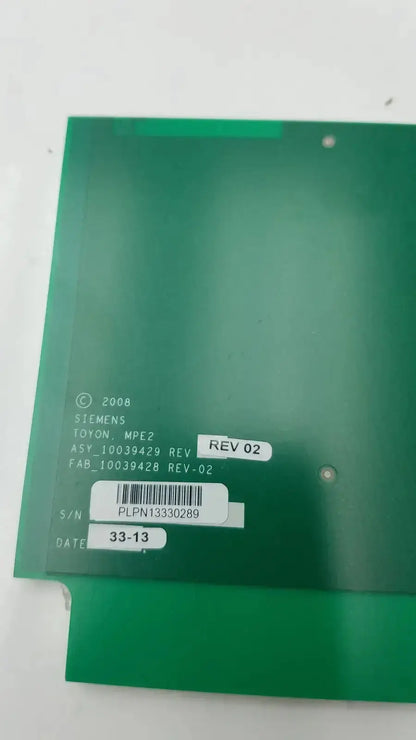 Green rectangular electronic circuit board with barcode labeled siemens sc2000 ultrasound mp extender board assy 10039429 rev 02
