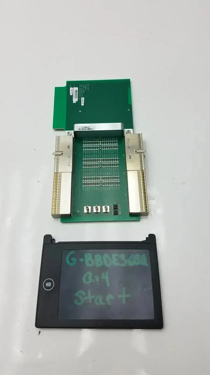 Black rectangular digital display with handwritten green text and circular button on siemens sc2000 ultrasound mp extender board