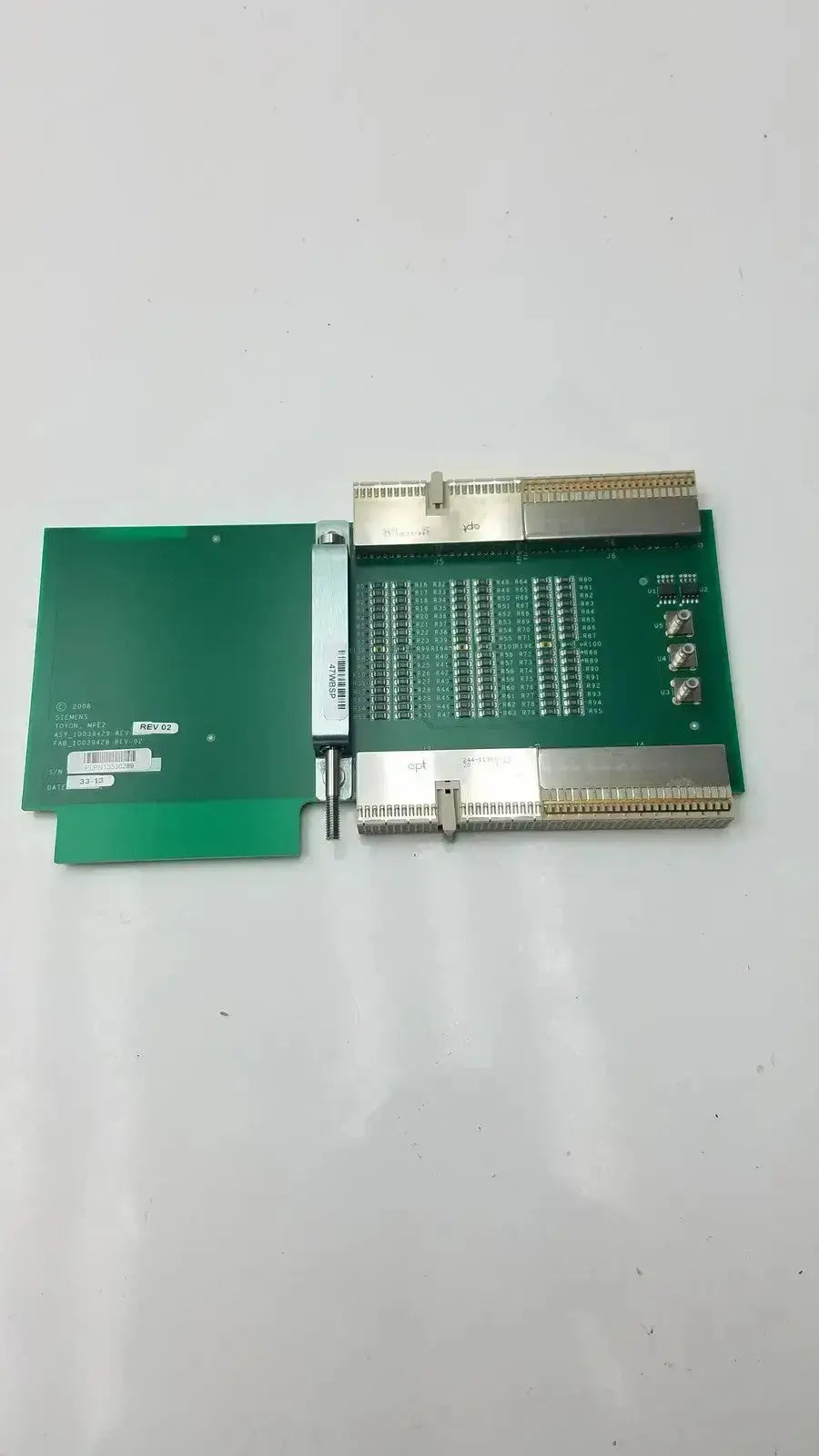Green printed circuit board with silver connectors and white label for siemens sc2000 ultrasound mp extender board assy 10039429 rev 02