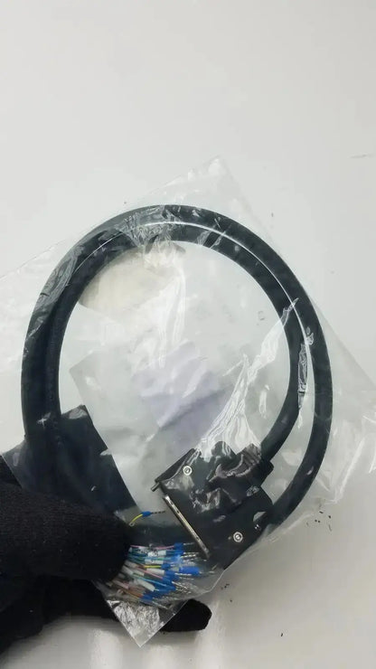 Black coiled signal cable 6sl3260-4na00-1vb0 with multi-pin connector and color-coded wires in clear plastic packaging for preassembled motor connection