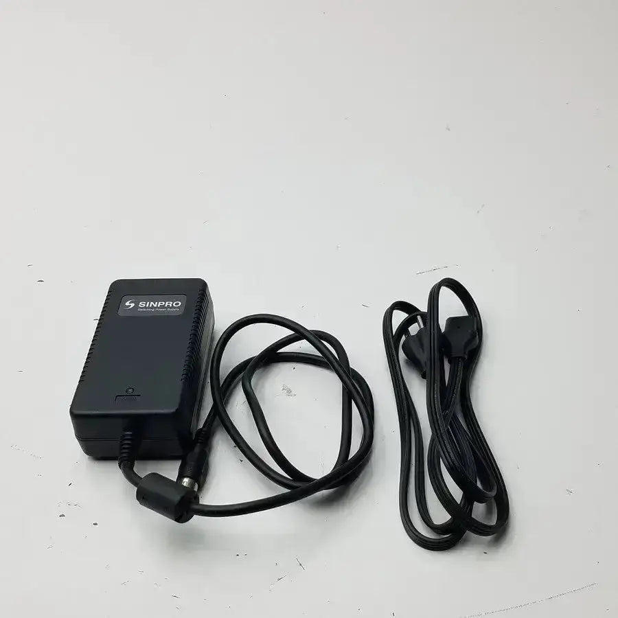 Black sinpro switching power supply adapter with coiled black cables g-bbde3-17k for buy used medical equipment