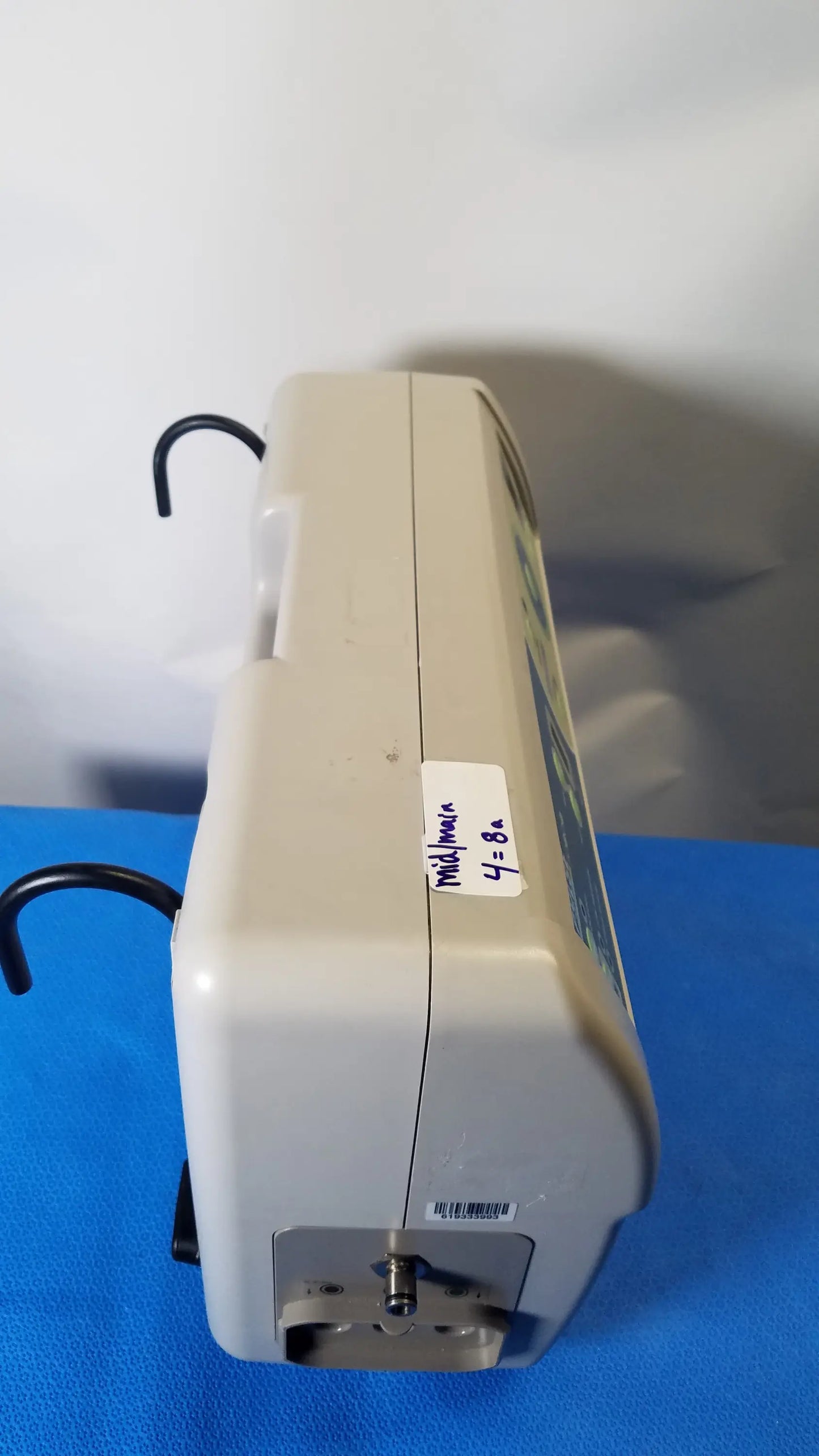 Beige sizewise sapphire low air loss mattress pump with mallinckrodt 4-8a label and black tubing hooks for pre owned medical equipment sale