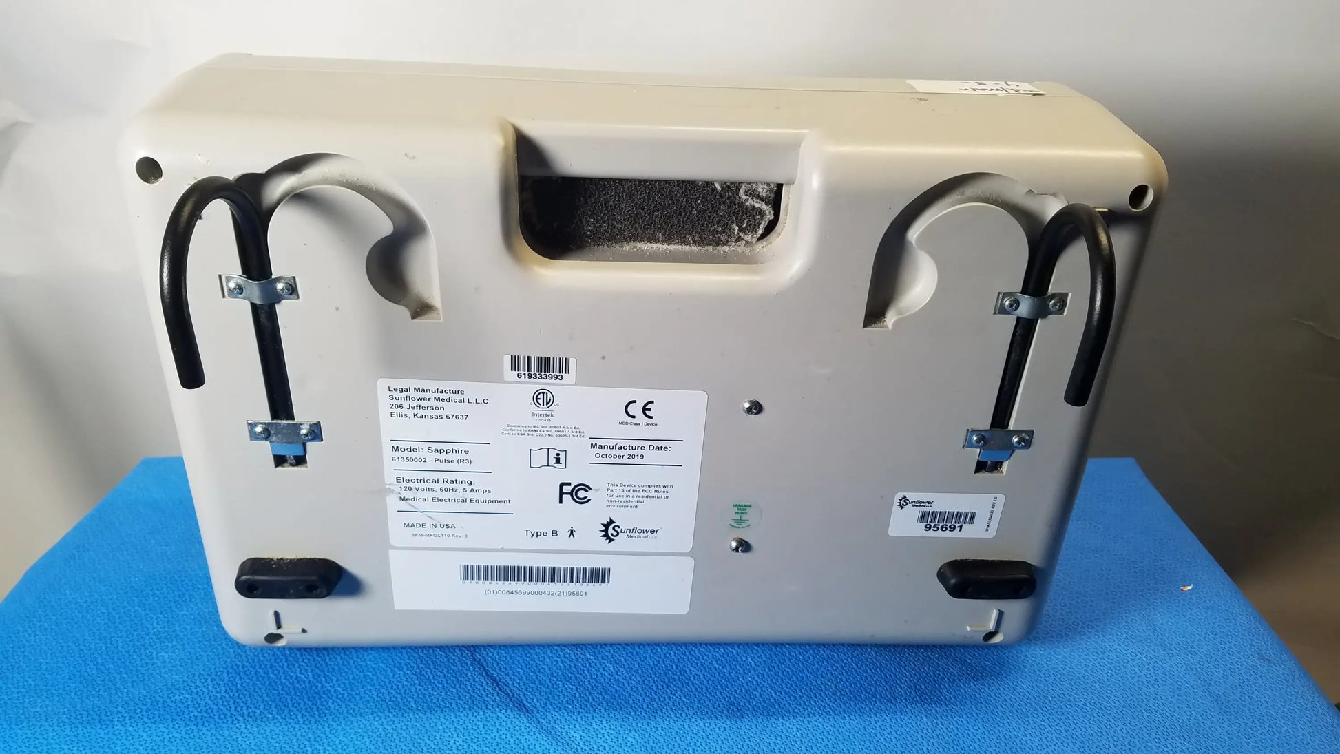 Beige plastic sizewise sapphire low air loss mattress pump with black tubing and metal brackets for pre owned medical equipment sale
