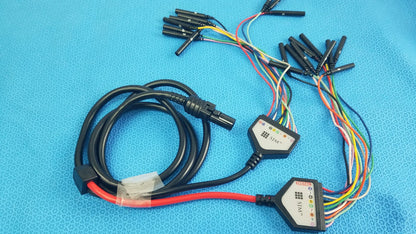 Black coiled SJM St Jude Medical diagnostic connection cable with hexagonal connectors and multi-colored wires for reuse medical equipment