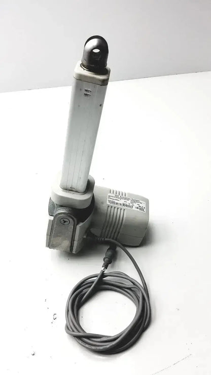 Gray skf actuation linear actuator max30-a150365ac5100-000 with cylindrical arm and coiled power cable from hospital surplus