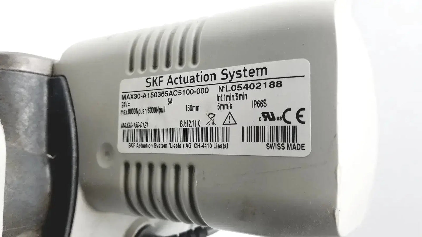 Gray metallic skf actuation system max30-a150365ac5100-000 linear actuator motor with technical specs and swiss made label for hospital surplus