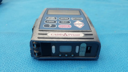 Black cadd prizm handheld radiation dosimeter with digital display and buttons used in medical equipment applications